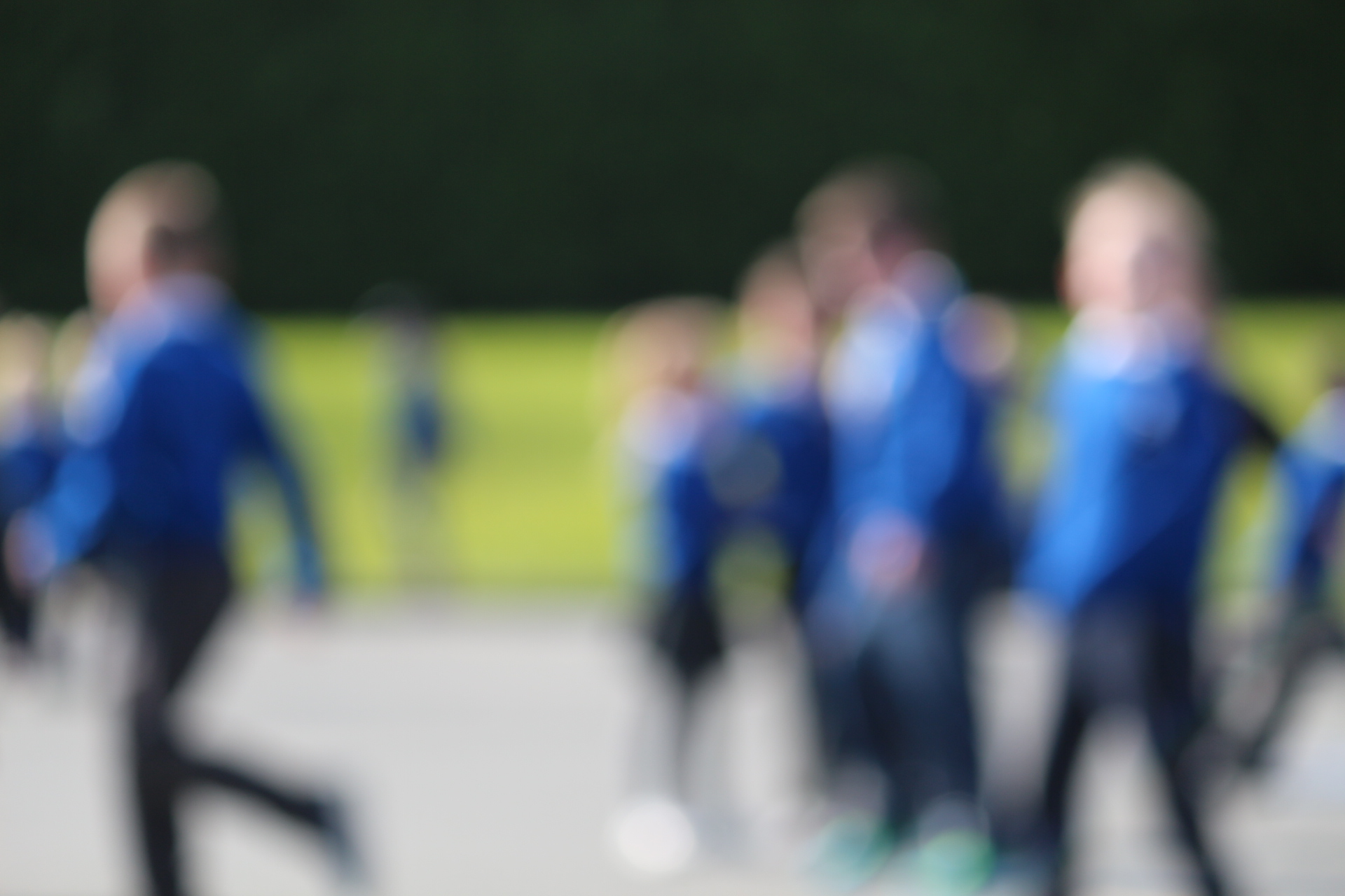 Blurred image of children in school playground