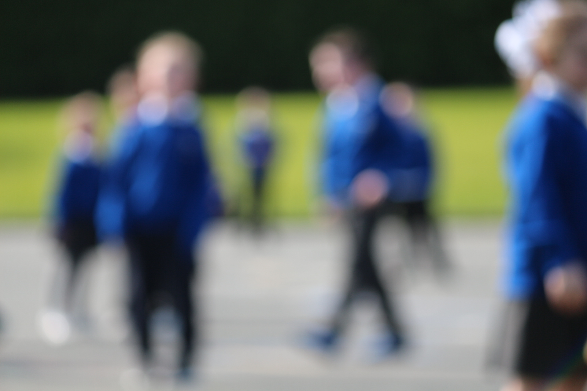 Blurred image of children in school playground